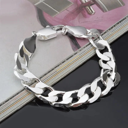 925er Silber Schweizer Figaro-Armband mit 6 bis 8 mm Zirkonia