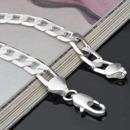 925er Silber Schweizer Figaro-Armband mit 6 bis 8 mm Zirkonia